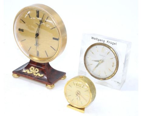 Small Imhof pedestal boudoir clock with 15 jewel movement, 5.25" high; also a German boudoir timepiece within a Perspex case,