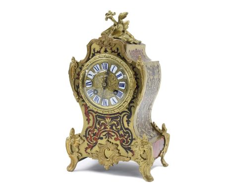 French Bulle two train balloon mantel clock striking on a gong, the 3.5" gilt dial with Roman cartouche enamel numerals, with