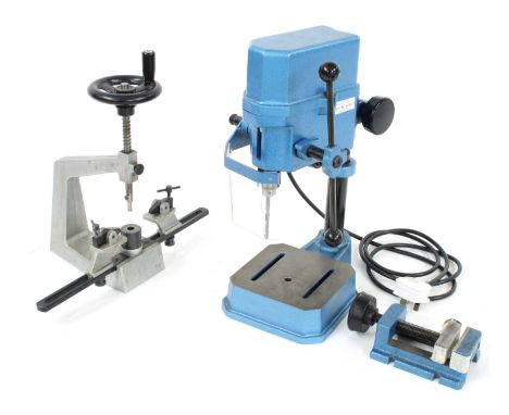 Bergeon &amp; Cie (no. 6200) and drilling tool, with maker's leaflet; also an electric upright drilling machine within a blue