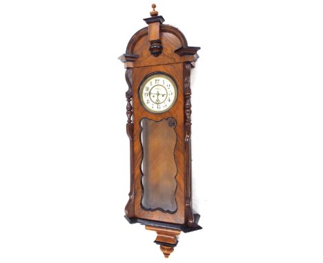 Figured walnut double weight Vienna regulator wall clock, the 6.75" cream dial with subsidiary seconds dial, within a pillare