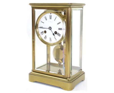 Small French brass four glass two train mantel clock striking on a bell, the 3.25" white dial indistinctly signed, within a s