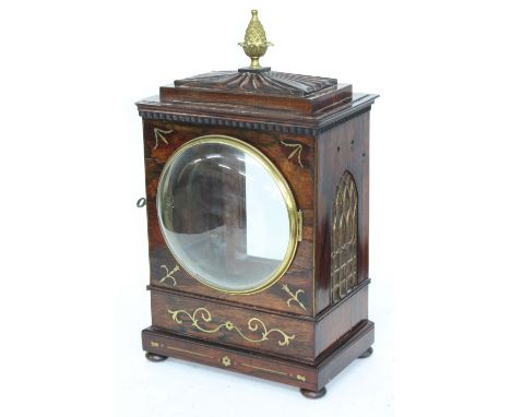 Regency rosewood mantel clock case with aperture for a 7" circular dial, with convex dial glass, within a stepped case inlaid