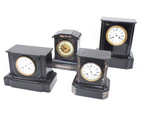 French black slate two train marble clock striking on a bell, 13" high; also three other smaller French black slate two train