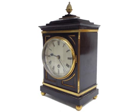 Ebonised and brass bound small mantel clock timepiece with platform movement, the 4.5" silvered dial within a panelled steppe
