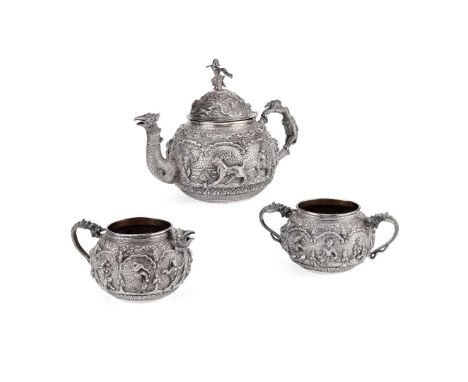  AN INDIAN THREE-PIECE TEA-SERVICE UNMARKED comprising teapot, twin-handled sugar basin and a milk jug, of a spherical form, 