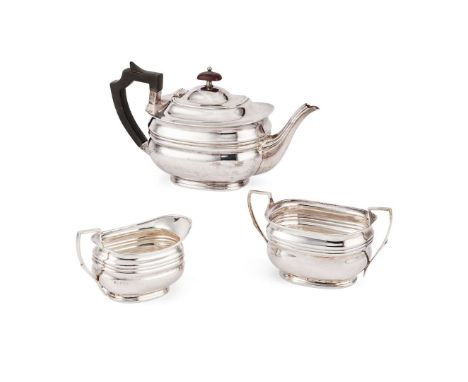  A GEORGE V THREE-PIECE TEA-SERVICE HENRY ATKINS, SHEFFIELD 1917 comprising a teapot, twin-handled sugar basin and a milk jug