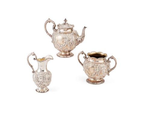  A VICTORIAN THREE-PIECE TEA-SERVICE T.W., BIRMINGHAM 1860 comprising teapot, twin-handled sugar basin and a milk jug, all of