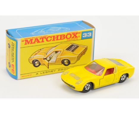 Matchbox Superfast 33a Lamborghini Miura - lemon yellow body, clear windows, red interior, bare metal base with tow guide, so