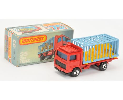 Matchbox Superfast 35c Volvo Zoo Truck - red body, light blue windows, blue plastic cage with yellow lions, black plastic gri