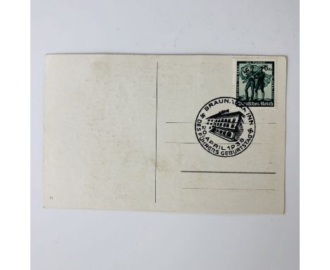 A 1938 postcard portrait of Adolf Hitler, the reverse stamped and franked on Hitler's birthday, the Führers Geburtstag
