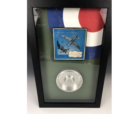 An ashtray fabricated from a Merlin engine piston as fitted to Spitfires and other aircraft, bearing an RAF crest and inscrip