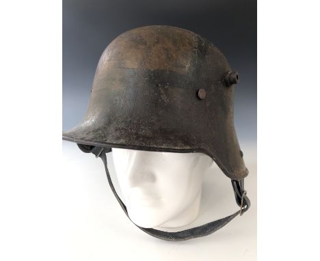 An Imperial German stahlhelm / helmet bearing officially designated painted camouflage