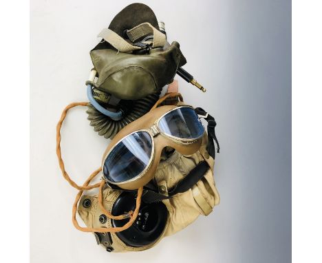 A Second World War USAAF A-15 flying helmet, together with A-10 oxygen mask and commercial Seesall flying goggles 