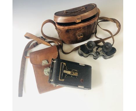 A Great War Army officer's binoculars and camera, those of Major C I de V I'Anson, The Loyal Regiment, the binoculars being R