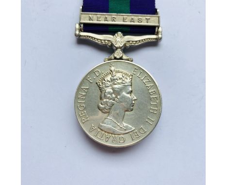 A General Service Medal with Near East clasp to 23226660 Sig J J Pollard, R Sigs