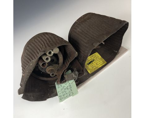 A Battle of Britain Luftwaffe aircraft wreck-recovered MG13 ammunition trommel bearing a label which reads "Ammunition pannie