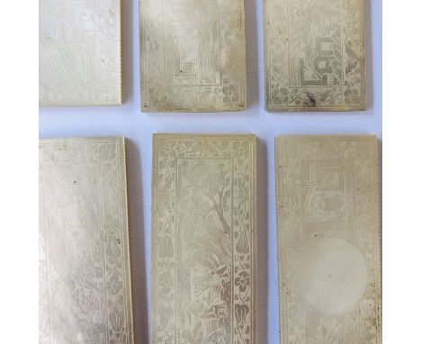 A Number of Chinese&nbsp;mother of pearl gaming tokens, of rectangular section, engraved with birds and foliage surrounding a