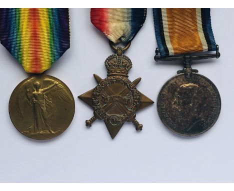 A 1914-15 Star, British War and Victory Medals to 1241 Gnr R Mackay, RFA