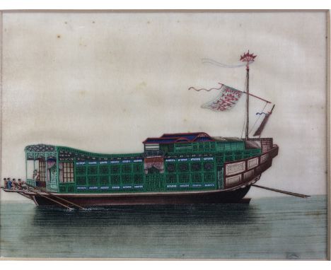 An early 19th century rice paper painting of a richly decorated Chinese boat on the Pearl River, framed and mounted under gla