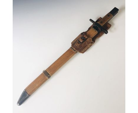 An Imperial Japanese Toyoda Jidoshoki Seisakusho Type 30 bayonet in wooden scabbard with  rubber frog