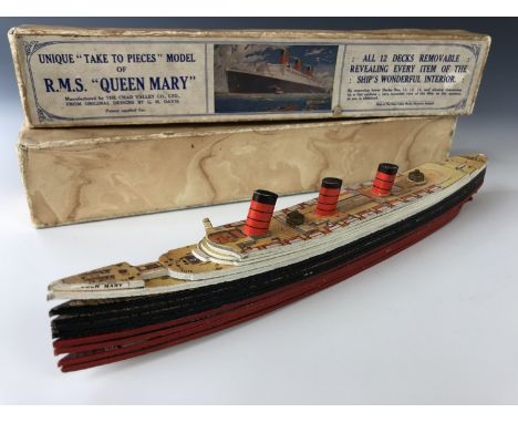 A Chad Valley 'Unique "Take to Pieces" Model of RMS "Queen Mary", boxed with paperwork