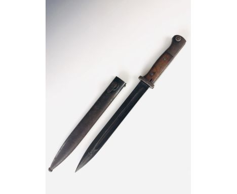 A German Third Reich S84/98 bayonet, stamped S/242 and dated 1936, in associated scabbard