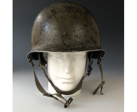 A Second World War US Army helmet for paratroop use