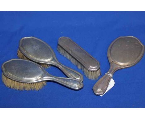 STERLING SILVER VANITY SET
attractive engine-turned design, comprising two hair brushes, one clothes brush and a hand mirror