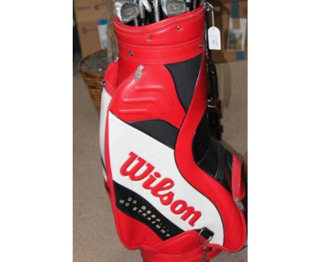 SET OF GOLF CLUBS WITH WILSON GOLF BAG
mixture of irons and drivers by Houson and Howson, red leather bag