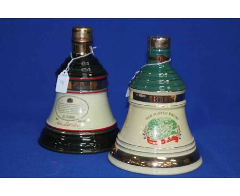 BELL'S CHRISTMAS 1991 BELL
Blended Scotch Whisky in  green & cream Wade porcelain decanter. 70cl, 40% volume, in tube.
BELL'S