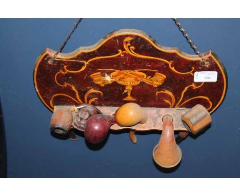 INTERESTING WALL MOUNTED SMOKER'S PIPE HOLDER
with six pipes, one carved