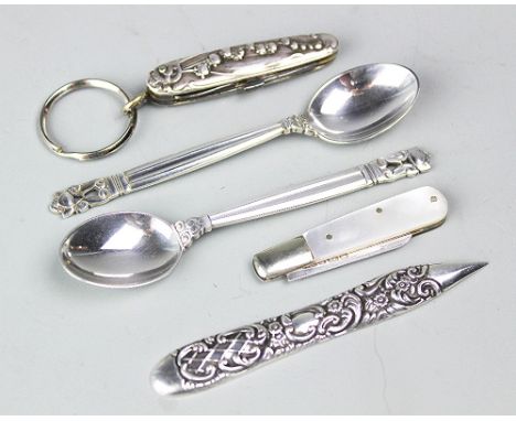 A pair of Georg Jensen Acorn pattern silver teaspoons, 9.7cm long, gross weight 21.8gms along with an Edwardian silver nail m