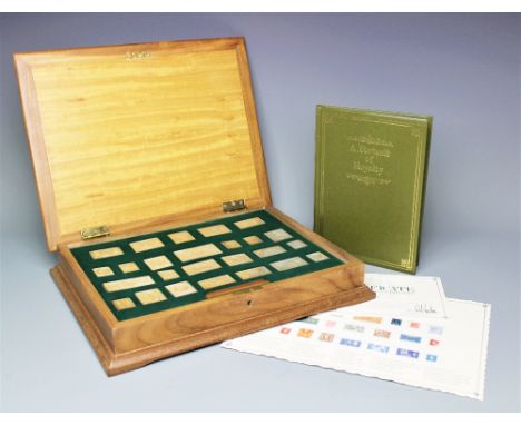 A limited edition Stamps of Royalty silver gilt stamp set of twenty five, within fitted leather case, with certificate, along