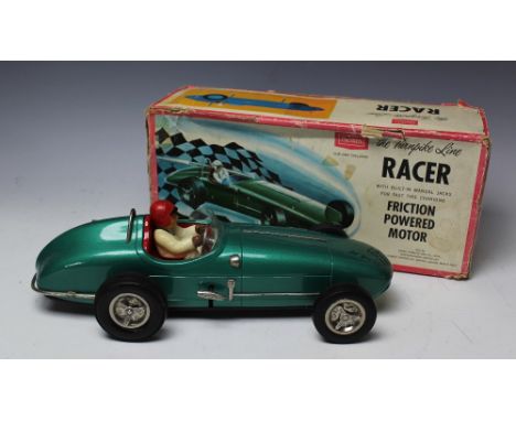 The Turnpike Line Racer by Sears, Roebuck and Co, USA with friction powered motor, built in manual jacks for fast tire changi