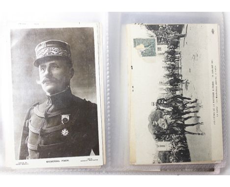 A collection of World War I and later postcards, including some real photographic, with a selection of cigarette cards includ