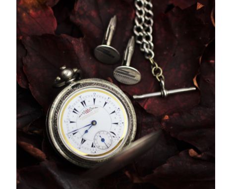 A late 19th century continental '800' standard silver pocket watch, the enamel dial with baton numerals and subsidiary second