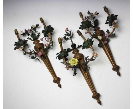 Three Louis XV style gilt metal twin branch wall lights, decorated with metal and ceramic flowers, 44cm high (3) CONDITION RE
