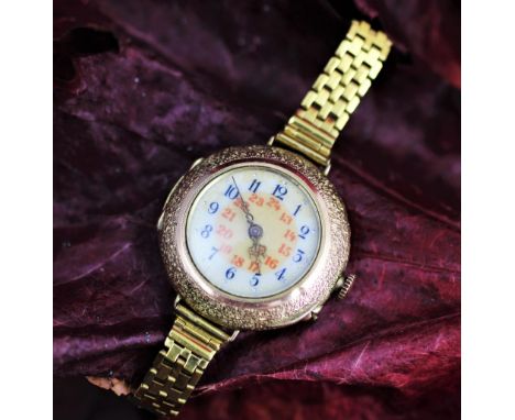 A ladys 14k watch, the circular white enamel dial with blue Arabic numerals and red 13-24 numerals, within decorative case st