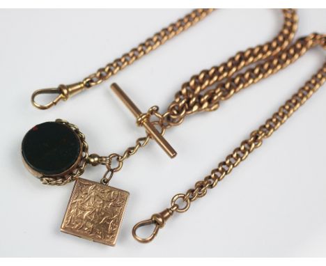 A 9ct yellow gold watch albert chain, the graduated curb link double albert with central T bar, bloodstone set fob and locket