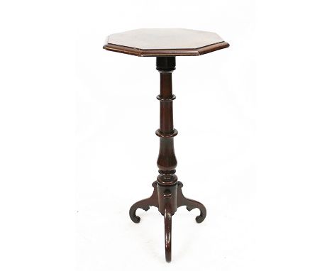 A 19th century walnut candle stand, with octagonal top on tripod base, 72cm H x 36cm Diameter 