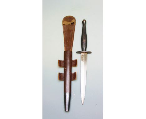 A WWII specification Wilkinson sword commando dagger 'The F-S Fighting knife', steel cross guard, knurled handle, in brown le