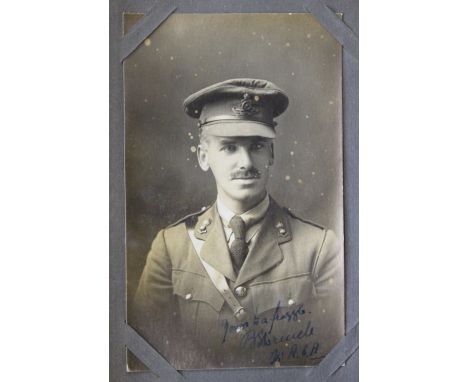 A collection of Edwardian and World War I mostly Military postcards and photographs, including read photographic examples, on
