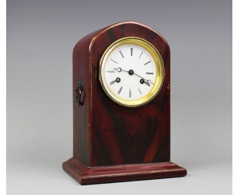 An early 20th century lacquered eight day mantel clock, with enamel Roman numeral dial and movement striking on a bell, 27cm 