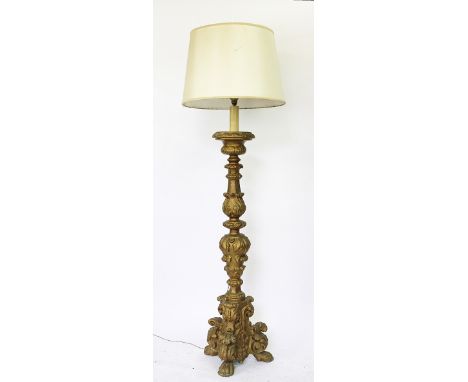 A 19th century gilt wood and gesso altar stick converted to a standard lamp, possibly Italian, on tripod base, 140cm - withou