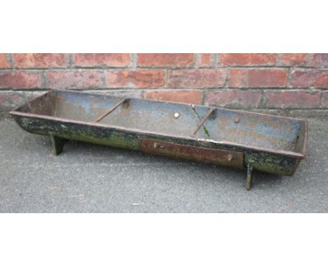 A 19th century cast iron trough / feeder, 93cm W, with a smaller cast iron trough (2)