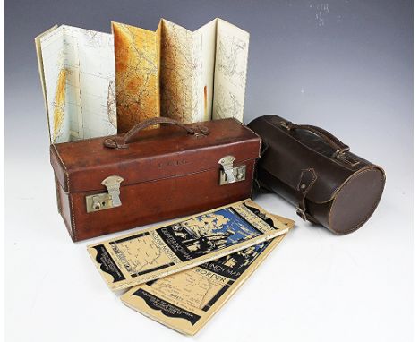 An Army and Navy leather case, enclosing eleven 1930's Ordnance Survey maps of Great Britain, (lacking sheet 5), with a tan l