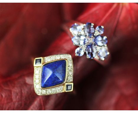 A lapiz lazuli and diamond set 9ct gold ring, of rhombus shape, designed as a central lapis within a diamond set surround, al