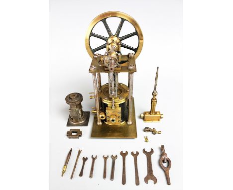 A late 19th/early 20th century brass and steel constructed industrial scale model compressor, with associated components and 