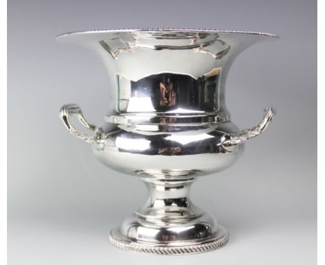 A Regency style silver plated twin handled wine cooler, 25.5cm high CONDITION REPORT: Several small dents to the sides, inter