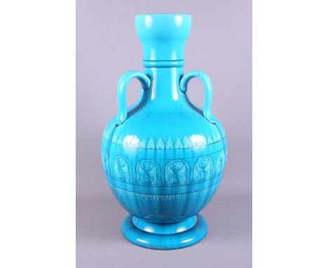 A Burmantofts turquoise glazed three-handled vase (now converted to a table lamp and restored), 22" high, a Bourne Denby two-